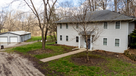 12± Acres with Creek, Shop & Spacious Home Near Cameron - image 1