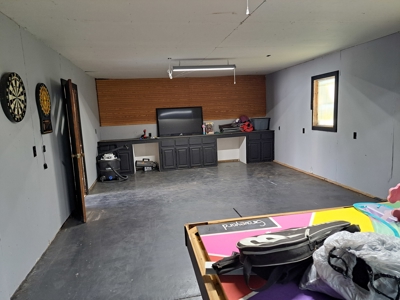 2BR Home Near Park w/ Garage, Workshop & Basement - image 13