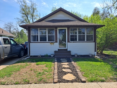 2BR Home Near Park w/ Garage, Workshop & Basement - image 1
