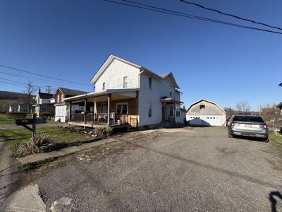 Make It Yours: In-Town 3BR with Oversized Garage & Bonus Space - image 2