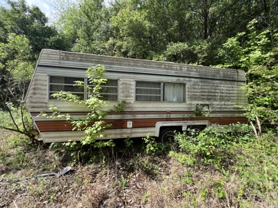 6.99+/- Wooded Acres with Pond For Sale in Higginson, AR - image 4