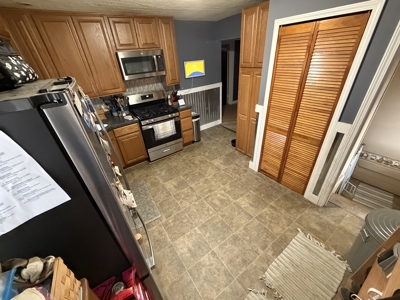 Newton Gem with 2 Garages, Patio Retreat and Prime Location - image 12