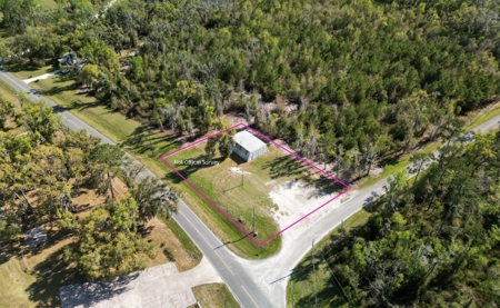 Prime Development Option .50-Acre Corner Lot with Steel Building - image 1