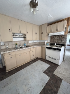 1945 Bungalow with Character and Opportunity! - image 9