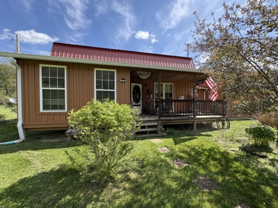 Rustic Charm Meets Modern Comfort on 6+ Acres! - image 1