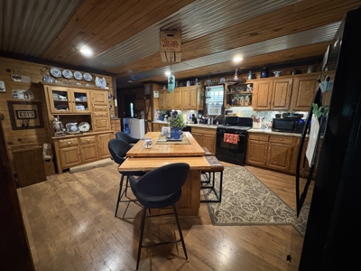 Rustic Charm Meets Modern Comfort on 6+ Acres! - image 2