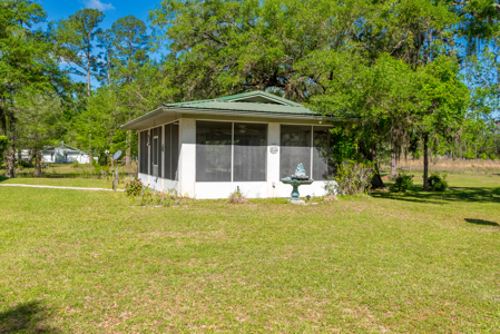 Unique 4-Bedroom Stucco Home on 2 Acres for Sale in Live Oak, FL - image 9