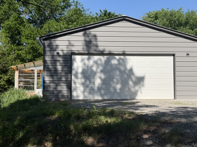 Land with RV parking and shop building - image 15