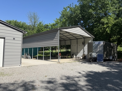 Land with RV parking and shop building - image 17