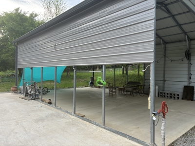 Land with RV parking and shop building - image 1