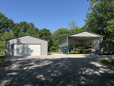Land with RV parking and shop building - image 16