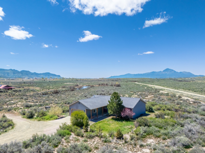 On grid solar home on acreage with privacy yet close to town - image 1