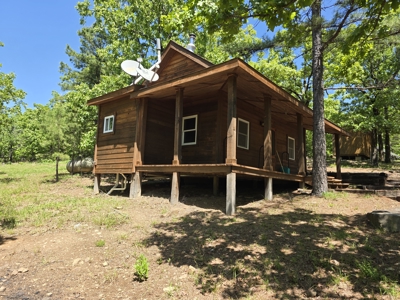 Off- Grid Cabin Adjoining National Forest - image 5