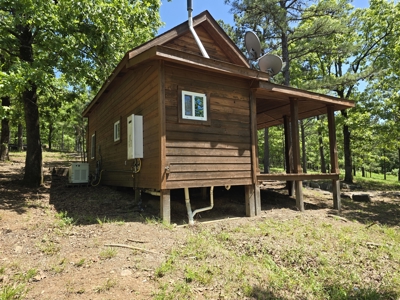 Off- Grid Cabin Adjoining National Forest - image 6