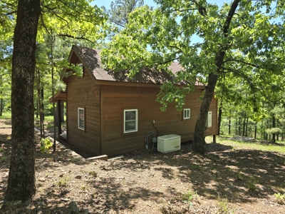 Off- Grid Cabin Adjoining National Forest - image 4
