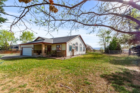 Home For Sale On Acreage With ADU in Montrose Colorado - image 2