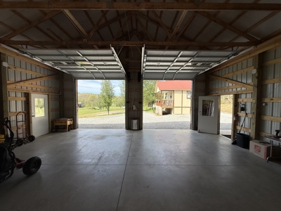 Creekfront Land for Sale in Tennessee with Pond, Shop, and Cabins - image 29
