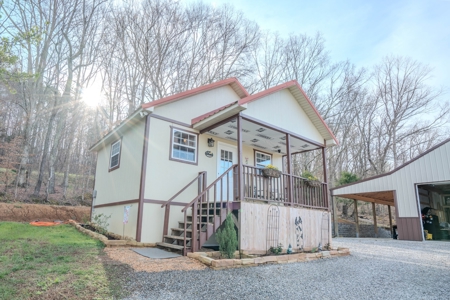 Creekfront Land for Sale in Tennessee with Pond, Shop, and Cabins - image 15
