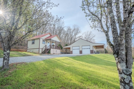 Creekfront Land for Sale in Tennessee with Pond, Shop, and Cabins - image 32