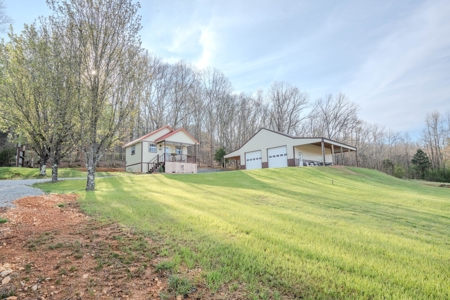 Creekfront Land for Sale in Tennessee with Pond, Shop, and Cabins - image 31