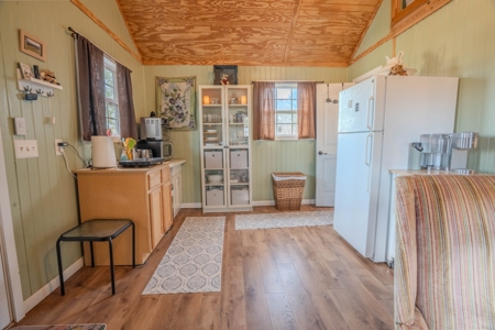 Creekfront Land for Sale in Tennessee with Pond, Shop, and Cabins - image 19