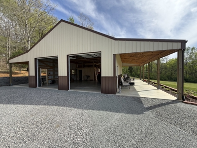 Creekfront Land for Sale in Tennessee with Pond, Shop, and Cabins - image 26