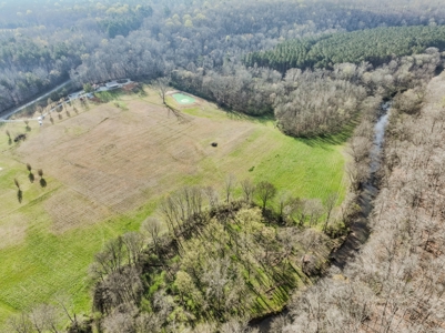 Creekfront Land for Sale in Tennessee with Pond, Shop, and Cabins - image 9
