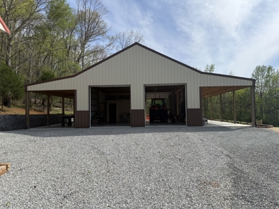 Creekfront Land for Sale in Tennessee with Pond, Shop, and Cabins - image 25