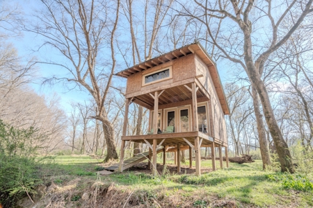 Creekfront Land for Sale in Tennessee with Pond, Shop, and Cabins - image 37