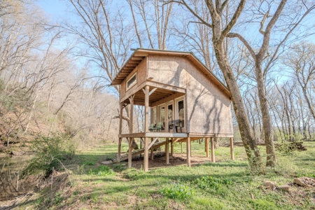 Creekfront Land for Sale in Tennessee with Pond, Shop, and Cabins - image 36