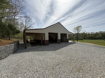 Creekfront Land for Sale in Tennessee with Pond, Shop, and Cabins - image 27