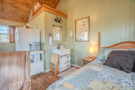 Creekfront Land for Sale in Tennessee with Pond, Shop, and Cabins - image 18