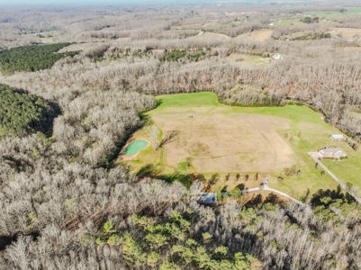Creekfront Land for Sale in Tennessee with Pond, Shop, and Cabins - image 14