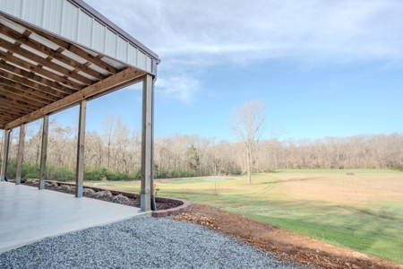 Creekfront Land for Sale in Tennessee with Pond, Shop, and Cabins - image 6