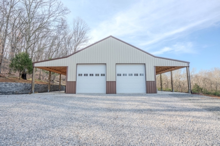 Creekfront Land for Sale in Tennessee with Pond, Shop, and Cabins - image 5