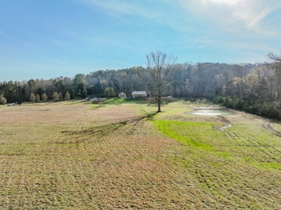 Creekfront Land for Sale in Tennessee with Pond, Shop, and Cabins - image 11