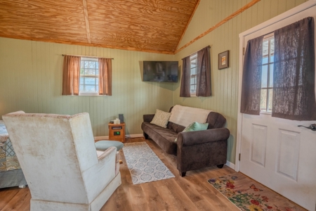 Creekfront Land for Sale in Tennessee with Pond, Shop, and Cabins - image 20