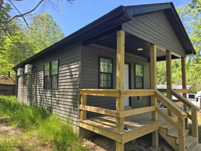 Affordable lake-area retreat with income potential - image 2