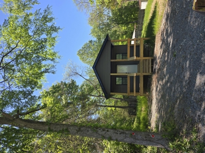 Affordable lake-area retreat with income potential - image 1
