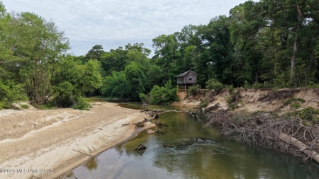 23 Acres of Riverfront Property with Sand Bar and Cabins - image 25