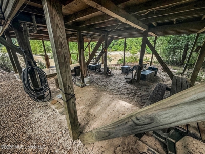 23 Acres of Riverfront Property with Sand Bar and Cabins - image 34