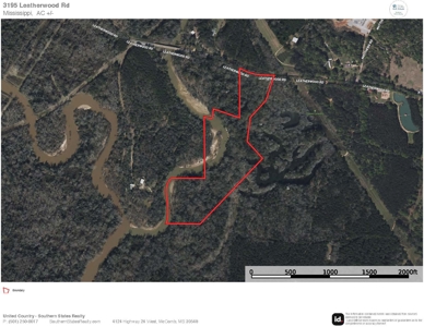 23 Acres of Riverfront Property with Sand Bar and Cabins - image 50