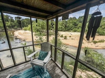 23 Acres of Riverfront Property with Sand Bar and Cabins - image 41