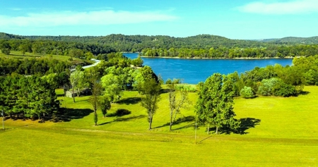 Lakefront Acreage – Gentle Walk-Down Shoreline & Highway Frontage - image 14