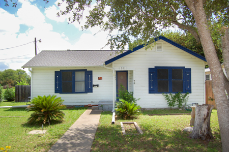 Charming Corner-lot Home with Investment Potential - image 1