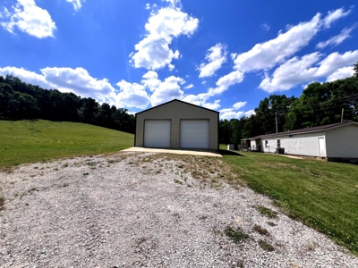 23.9 Tennessee Acres with Home, Shop & RV Hookup for Sale - image 19
