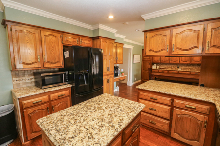 Versatile Rural Estate with Barns, an AMAZING Home & Acreage! - image 23