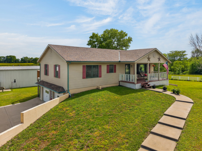 Country Home with Acreage and Shop Buildings Near KC - image 3