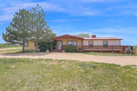 Country home for sale with acreage in Colorado - image 1