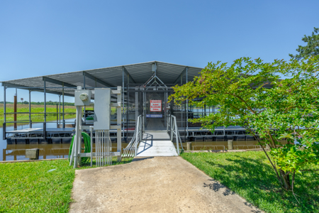 High-ROI Lakefront Investment Property with 36-Slip Marina, Water - image 12